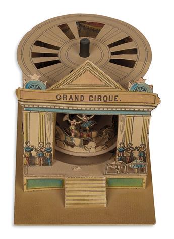 (CHILDRENS LITERATURE.) OPTICAL TOY. Grand Cirque Carousel and instruction sheet.